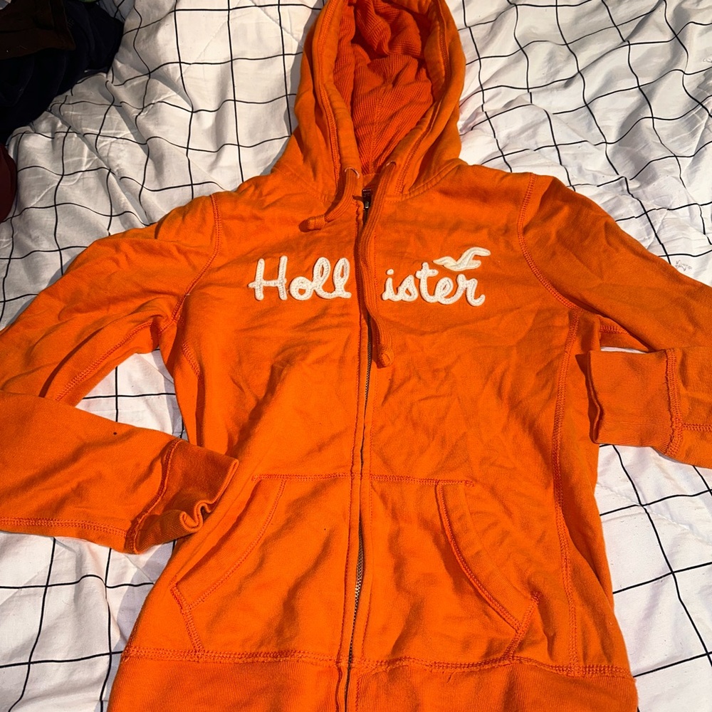 orange hollister zip up hoodie
